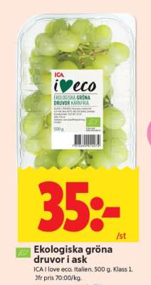 Ekologiska gröna druvor i ask